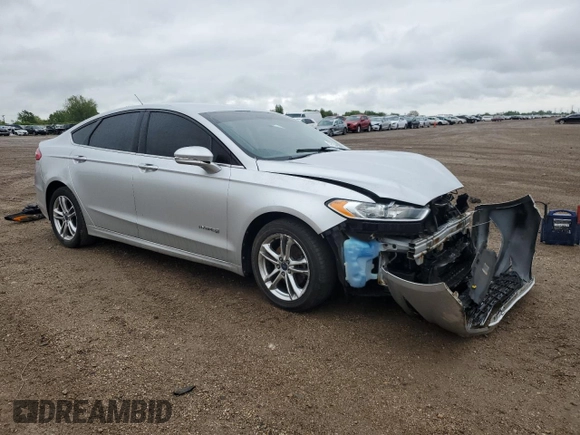 2013 Ford Fusion SE Hybrid с VIN 3FA6P0LU9DR233472, выставлен на аукционе Copart как лот 57994345 с пробегом 194 862 миль миль и Списание • Salvage title. История ставок и продаж доступна на DreamBid. Изображение 4.