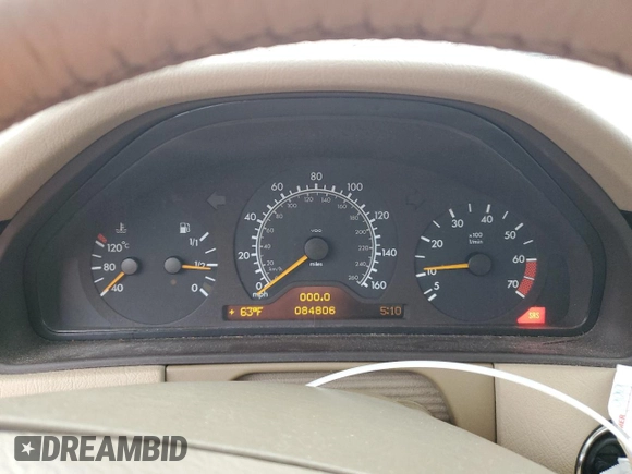 1999 Mercedes-Benz E-Class with VIN WDBJF65H9XA929577, listed as a Copart auction lot 71932364 with 84,806 mi miles and Salvage Title. Bid and sale history available at carsss.com. Image 9.