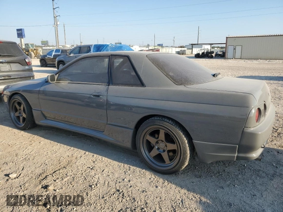 1992 Nissan Skyline z VIN HNR32035831, wystawiony jako Copart lot #74228974 z przebiegiem 49 082 mil mil oraz Szkoda całkowita • Salvage title. Historia ofert i sprzedaży dostępna na DreamBid. Obrazek 3.