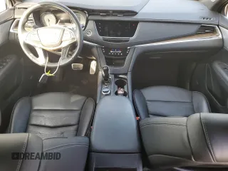 2021 Cadillac XT5 AWD Sport with VIN 1GYKNHRS3MZ103180, listed as a Copart auction lot 77166714 with 17,659 mi miles and Salvage title. Bid and sale history available at DreamBid. Image 8.