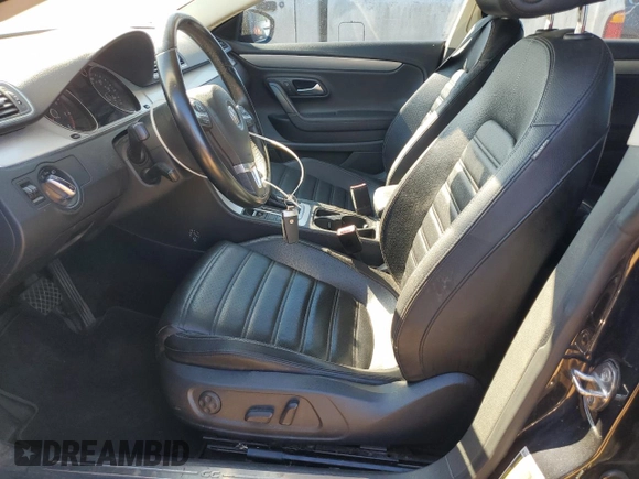 2014 Volkswagen CC R-Line with VIN WVWBP7AN9EE501261, listed as a Copart auction lot 75701194 with 73,123 mi miles and Salvage Title. Bid and sale history available at carsss.com. Image 7.