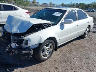 2003 Acura TL with VIN 19UUA56623A066329, listed as a IAAI auction lot 41834882 with 194,525 mi miles. Bid and sale history available at carsss.com. Image 2.
