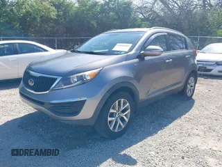 2014 Kia Sportage LX with VIN KNDPBCAC3E7587943, listed as a IAAI auction lot 42092903 with 153,483 mi miles and . Bid and sale history available at carsss.com. Image 2.