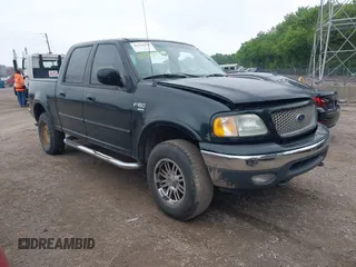 2001 Ford F-150 XLT z VIN 1FTRW08L11KA29033, wystawiony jako IAAI lot #42323970 z przebiegiem Nie podano mil oraz . Historia ofert i sprzedaży dostępna na DreamBid. Obrazek 1.