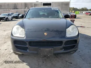 2005 Porsche Cayenne S with VIN WP1AB29PX5LA61015, listed as a Copart auction lot 76097734 with 106,331 mi miles and Salvage Title. Bid and sale history available at carsss.com. Image 5.