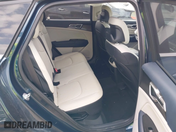 2023 Kia Sportage EX with VIN KNDPVCAGXP7104090, listed as a IAAI auction lot 42144158 with 26,983 mi miles and . Bid and sale history available at DreamBid. Image 8.