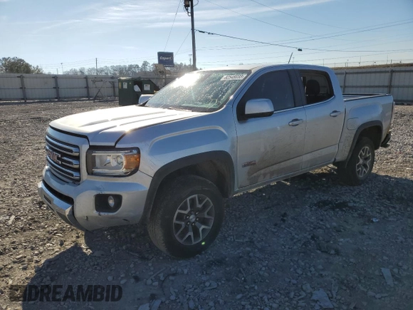 2016 GMC Canyon 4WD SLE with VIN 1GTG6CE36G1179618, listed as a Copart auction lot 82548033 with 101,095 mi miles and Salvage Title. Bid and sale history available at carsss.com. Image 1.