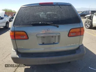 2000 Toyota Sienna CE with VIN 4T3GF19C9YU272554, listed as a Copart auction lot 73125134 with 240,998 mi miles and Salvage Title. Bid and sale history available at carsss.com. Image 6.