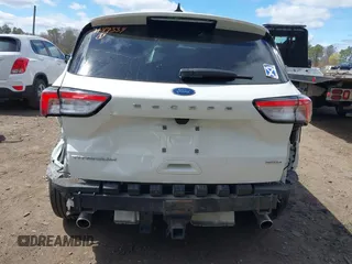 2021 Ford Escape Titanium with VIN 1FMCU9J94MUA27571, listed as a IAAI auction lot 42008938 with 32,592 mi miles and . Bid and sale history available at carsss.com. Image 16.