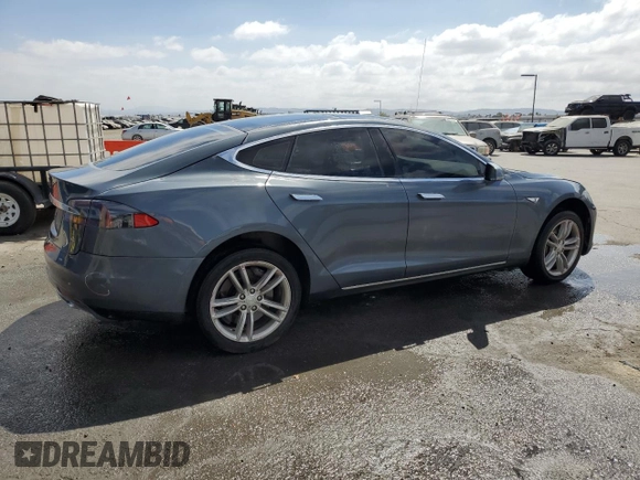 2013 Tesla Model S with VIN 5YJSA1CG9DFP09733, listed as a Copart auction lot 71574474 with 88,163 mi miles and Salvage title. Bid and sale history available at DreamBid. Image 3.