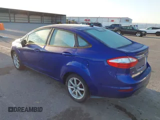 2014 Ford Fiesta SE z VIN 3FADP4BJ5EM243551, wystawiony jako IAAI lot #41919239 z przebiegiem 92 396 mil mil oraz . Historia ofert i sprzedaży dostępna na DreamBid. Obrazek 3.