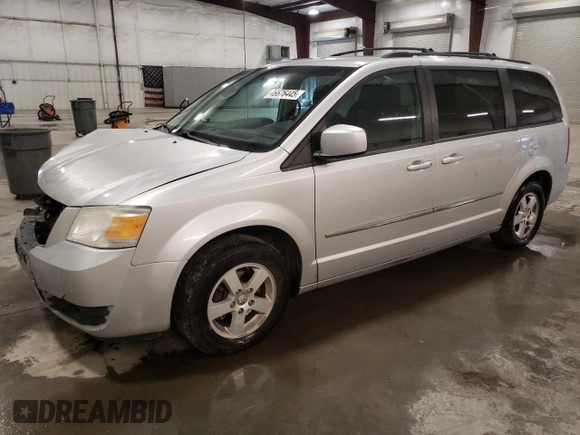 2010 Dodge Grand Caravan SXT with VIN 2D4RN5D19AR409665, listed as a Copart auction lot 46676445 with 174,063 mi miles and Salvage Title. Bid and sale history available at DreamBid. Image 1.