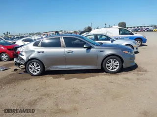 2016 Kia Optima LX with VIN 5XXGT4L39GG116566, listed as a IAAI auction lot 41949407 with 82,679 mi miles. Bid and sale history available at carsss.com. Image 14.