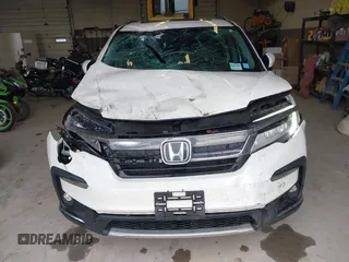 2019 Honda Pilot Elite with VIN 5FNYF6H08KB054725, listed as a IAAI auction lot 40496860 with 91,284 mi miles and . Bid and sale history available at DreamBid. Image 6.