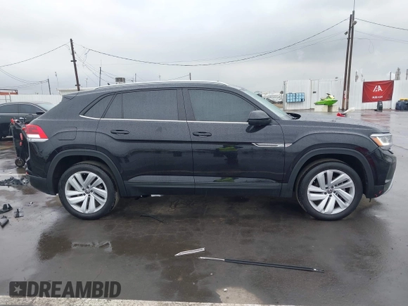 2022 Volkswagen Atlas SE z VIN 1V2WE2CA3NC203707, wystawiony jako IAAI lot #41720912 z przebiegiem 50 572 mil mil oraz . Historia ofert i sprzedaży dostępna na DreamBid. Obrazek 14.