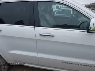 2014 Jeep Grand Cherokee Overland with VIN 1C4RJECG4EC543092, listed as a IAAI auction lot 40981315 with 149,096 mi miles. Bid and sale history available at carsss.com. Image 14.