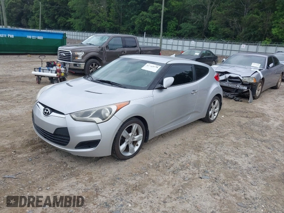 2012 Hyundai Veloster w/Gray Int с VIN KMHTC6AD5CU036042, выставлен на аукционе IAAI как лот 42423678 с пробегом 132 909 миль миль и . История ставок и продаж доступна на DreamBid. Изображение 2.