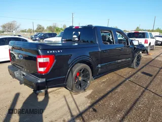 2023 Ford F-150 XL with VIN 1FTFW1E55PKF11768, listed as a IAAI auction lot 41073077 with Not provided miles and . Bid and sale history available at DreamBid. Image 4.