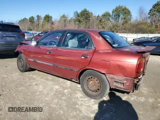 2001 Suzuki Esteem GL z VIN JS2GB41S915202412, wystawiony jako Copart lot #88372235 z przebiegiem 301 061 mil mil oraz Szkoda całkowita • Salvage title. Historia ofert i sprzedaży dostępna na DreamBid. Obrazek 2.