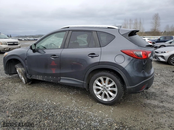 2015 Mazda CX-5 Grand Touring with VIN JM3KE4DY0F0498122, listed as a Copart auction lot 50088005 with 79,150 mi miles and Salvage Title. Bid and sale history available at carsss.com. Image 2.