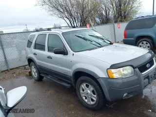 2002 Ford Escape Limited with VIN 1FMCU04152KA38640, listed as a IAAI auction lot 41895674 with 106,449 mi miles. Bid and sale history available at carsss.com. Image 1.