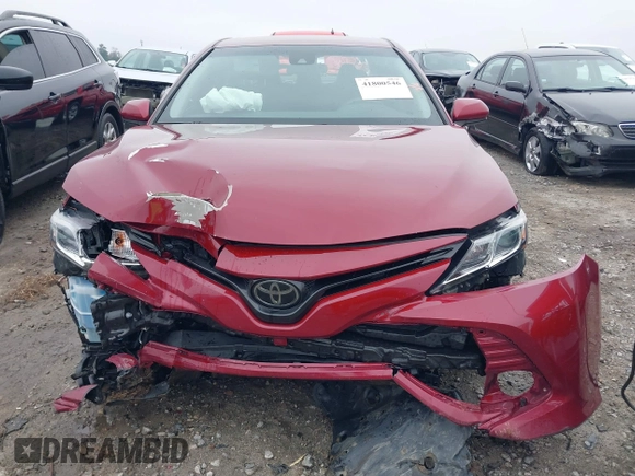 2020 Toyota Camry LE with VIN 4T1C11AK1LU359477, listed as a IAAI auction lot 41800546 with 109,319 mi miles and . Bid and sale history available at DreamBid. Image 13.
