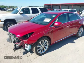 2014 Cadillac XTS Luxury with VIN 2G61M5S39E9143218, listed as a IAAI auction lot 42601268 with 37,172 mi miles and . Bid and sale history available at DreamBid. Image 2.