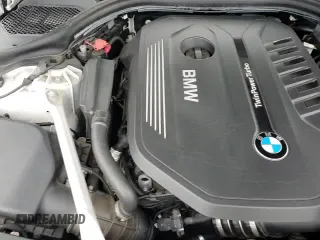 2019 BMW 5 Series 540i xDrive z VIN WBAJE7C57KWW16703, wystawiony jako Copart lot #69244285 z przebiegiem 29 239 mil mil oraz Szkoda całkowita • Salvage title. Historia ofert i sprzedaży dostępna na DreamBid. Obrazek 13.