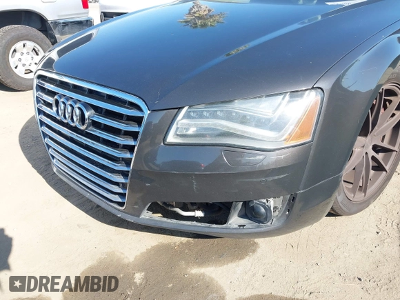 2011 Audi A8 with VIN WAURVAFD9BN014362, listed as a IAAI auction lot 41960366 with 135,244 mi miles and . Bid and sale history available at DreamBid. Image 6.