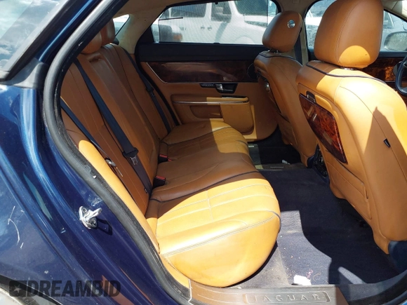 2011 Jaguar XJ XJL z VIN SAJWA2GB9BLV06939, wystawiony jako IAAI lot #42545872 z przebiegiem 80 008 mil mil oraz . Historia ofert i sprzedaży dostępna na DreamBid. Obrazek 8.