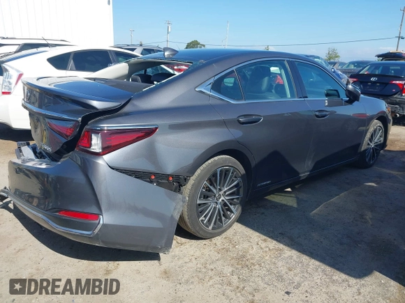 2022 Lexus ES 300h with VIN 58ADA1C15NU026266, listed as a IAAI auction lot 42121610 with 18,059 mi miles and . Bid and sale history available at DreamBid. Image 4.
