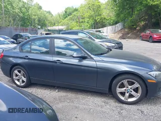 2014 BMW 3 Series 320i xDrive with VIN WBA3C3C57EP662795, listed as a IAAI auction lot 42267683 with 153,451 mi miles and . Bid and sale history available at DreamBid. Image 14.