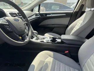 2016 Ford Fusion S with VIN 3FA6P0G79GR388774, listed as a IAAI auction lot 42155497 with 180,215 mi miles. Bid and sale history available at carsss.com. Image 1.