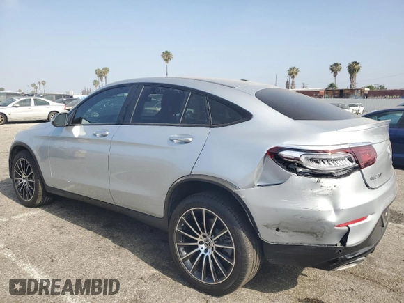 2021 Mercedes-Benz GLC 300 with VIN W1N0J8EB1MF874553, listed as a Copart auction lot 57517415 with 62,413 mi miles and Salvage title. Bid and sale history available at DreamBid. Image 2.