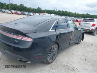 2015 Lincoln MKZ Hybrid with VIN 3LN6L2LU6FR626572, listed as a IAAI auction lot 38101589 with 151,492 mi miles and . Bid and sale history available at DreamBid. Image 4.