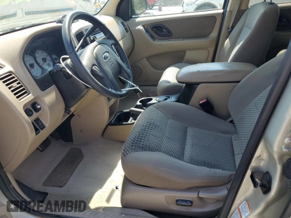2004 Ford Escape XLT with VIN 1FMCU03134KB53192, listed as a Copart auction lot 62178075 with 223,637 mi miles and Salvage title. Bid and sale history available at DreamBid. Image 7.
