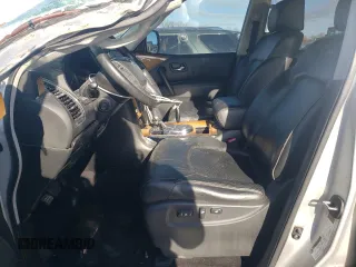 2012 Infiniti QX56 8-passenger with VIN JN8AZ2ND0C9716452, listed as a Copart auction lot 84933724 with 127,884 mi miles and Salvage Title. Bid and sale history available at carsss.com. Image 7.