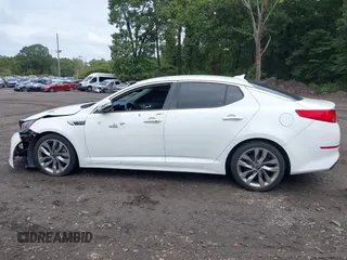 2014 Kia Optima SXL Turbo with VIN 5XXGR4A65EG263055, listed as a IAAI auction lot 40468453 with 93,494 mi miles and . Bid and sale history available at DreamBid. Image 14.