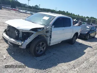 2022 Honda Ridgeline RTL with VIN 5FPYK3F51NB025152, listed as a IAAI auction lot 42325957 with 54,632 mi miles and . Bid and sale history available at DreamBid. Image 17.