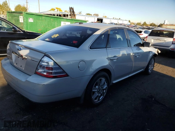 2009 Ford Taurus Limited with VIN 1FAHP25W89G101188, listed as a Copart auction lot 77220984 with 149,142 mi miles and Salvage Title. Bid and sale history available at carsss.com. Image 3.