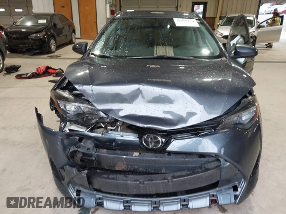 2018 Toyota Corolla L z VIN 5YFBURHE1JP750399, wystawiony jako IAAI lot #42018170 z przebiegiem 83 867 mil mil oraz . Historia ofert i sprzedaży dostępna na DreamBid. Obrazek 6.