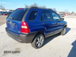 2005 Kia Sportage LX with VIN KNDJF723157097517, listed as a IAAI auction lot 41485759 with 207,294 mi miles and . Bid and sale history available at carsss.com. Image 4.