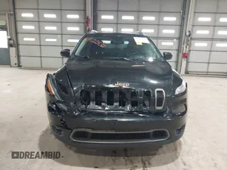 2016 Jeep Cherokee Latitude with VIN 1C4PJMCB5GW289738, listed as a IAAI auction lot 41472536 with 175,292 mi miles. Bid and sale history available at carsss.com. Image 13.