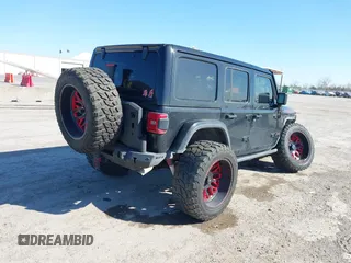 2018 Jeep Wrangler Unlimited Rubicon z VIN 1C4HJXFGXJW108766, wystawiony jako IAAI lot #41846062 z przebiegiem 96 791 mil mil oraz . Historia ofert i sprzedaży dostępna na DreamBid. Obrazek 4.