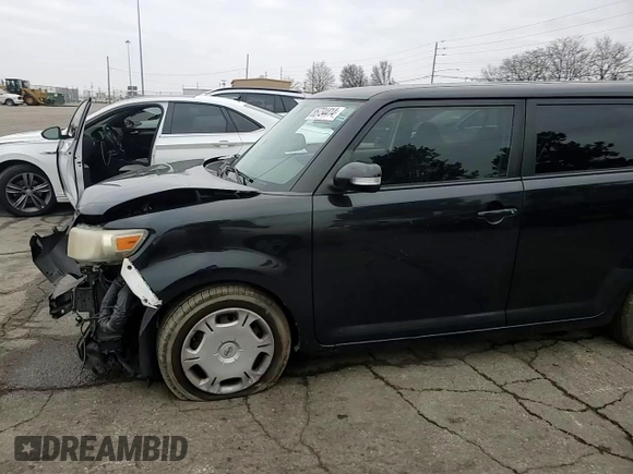 2014 Scion xB z VIN JTLZE4FE7EJ049074, wystawiony jako Copart lot #85734414 z przebiegiem 102 358 mil mil oraz Szkoda całkowita • Salvage title. Historia ofert i sprzedaży dostępna na DreamBid. Obrazek 12.
