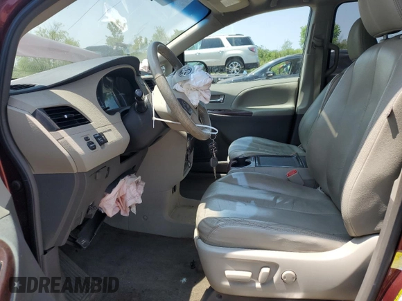 2012 Toyota Sienna XLE AAS с VIN 5TDYK3DC8CS213413, выставлен на аукционе Copart как лот 58670965 с пробегом 175 213 миль миль и Списание • Salvage title. История ставок и продаж доступна на DreamBid. Изображение 7.