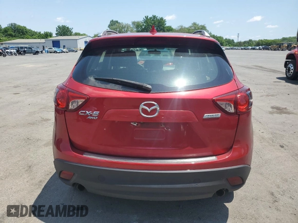2016 Mazda CX-5 Sport with VIN JM3KE4BY3G0765905, listed as a Copart auction lot 61874165 with 134,546 mi miles and Salvage title. Bid and sale history available at DreamBid. Image 6.