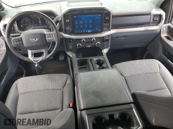 2021 Ford F-150 XL with VIN 1FTEW1CP2MKE62928, listed as a Copart auction lot 59882525 with 32,481 mi miles and Salvage title. Bid and sale history available at DreamBid. Image 8.