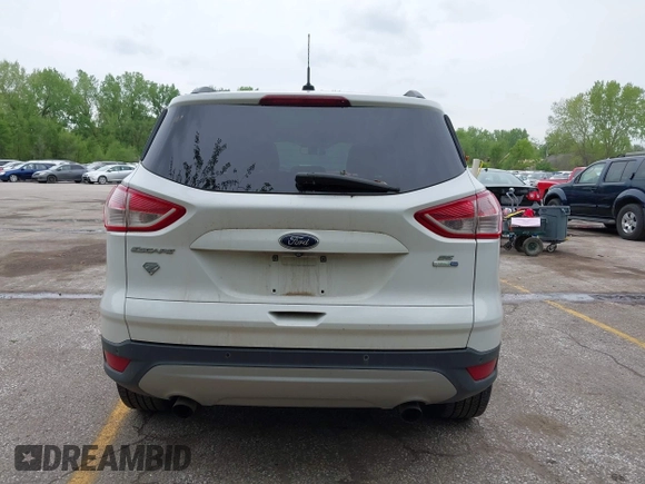 2016 Ford Escape SE with VIN 1FMCU9GX1GUC04085, listed as a IAAI auction lot 42126826 with 130,728 mi miles. Bid and sale history available at carsss.com. Image 16.