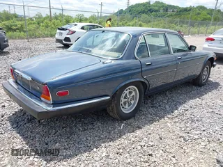 1987 Jaguar XJ with VIN SAJAV1348HC477152, listed as a IAAI auction lot 42274741 with Not provided miles and . Bid and sale history available at DreamBid. Image 4.